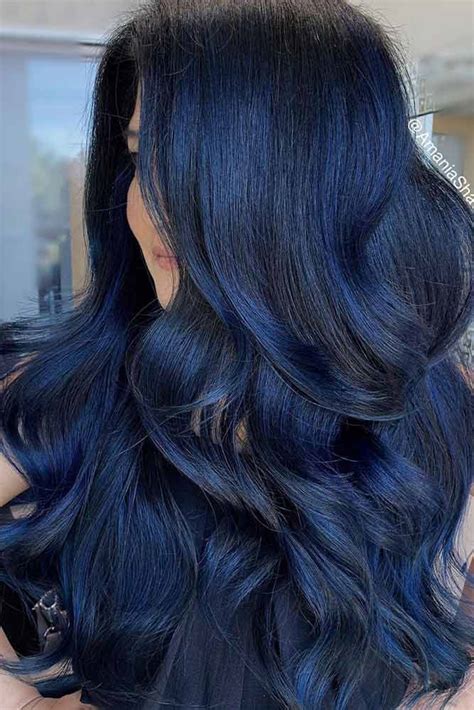 dark hair blue streaks|reflective blue black hair color.